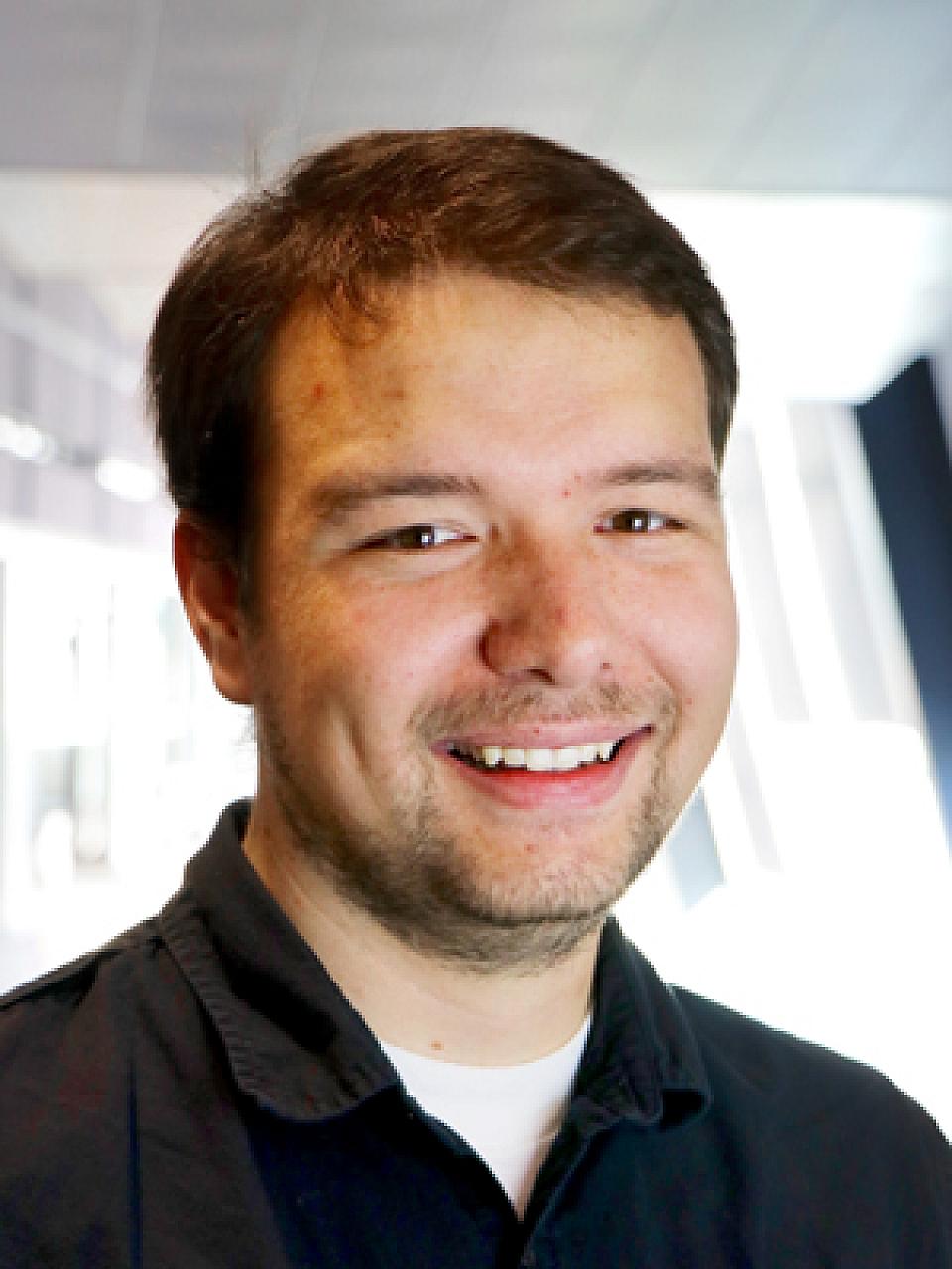 Tyler W. Knighton